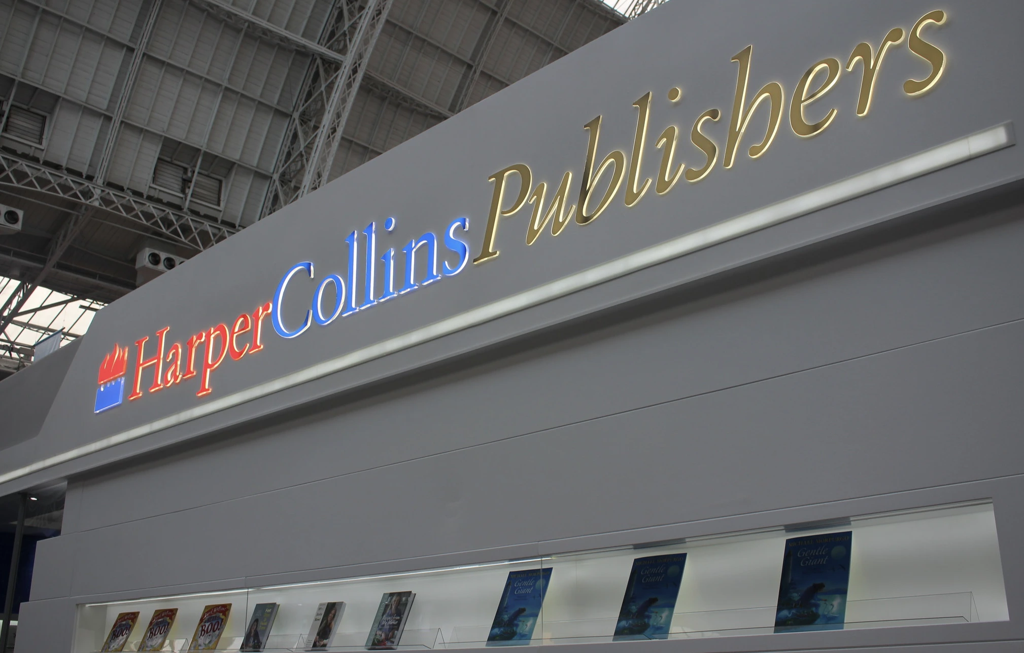 HarperCollins Partners With AI Company, Authors Debate Participation