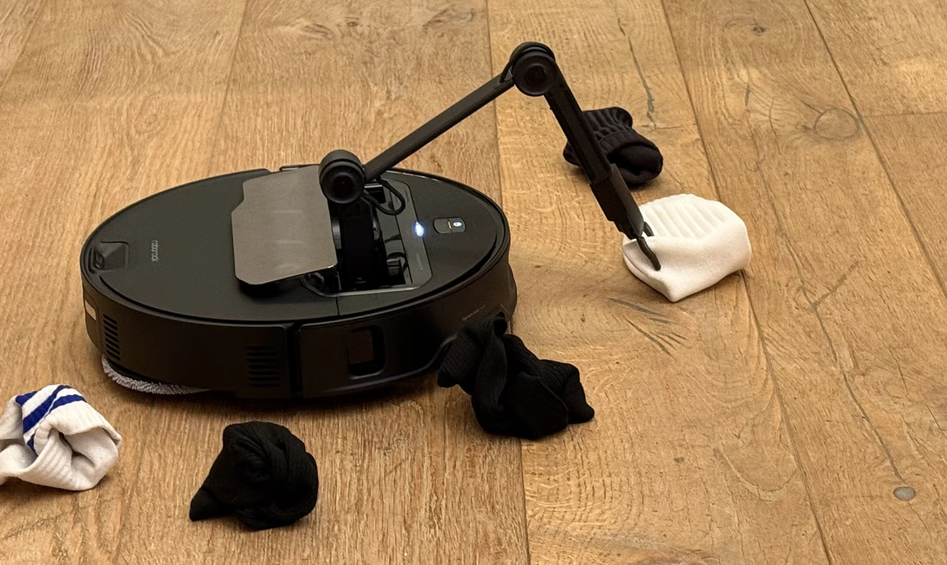 Roborock’s Z70 Vacuum Features Robotic Arm To Clear Obstacles